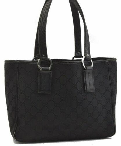 Authentic GUCCI Hand Bag: Brand: GUCCI Model: Hand Bag Country of Origin: Italy Material: Canvas Color: Black Bag Length: 10.6inches (27cm) Bag Height: 8.3inches (21cm) Bag Depth: 3.7inches (9.5cm) All Bidhaus items come with 