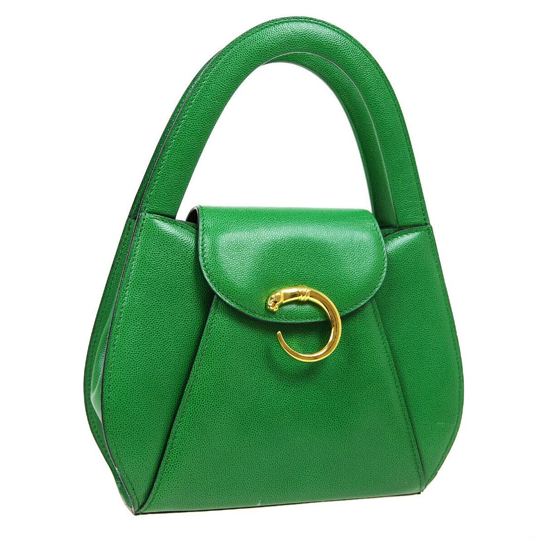 Authentic CARTIER Hand Bag: Brand: CARTIER Model: Hand Bag Country of Origin: France Material: Leather Color: Green Size (Inch): W 7.5 x H 7.1 x D 2.8 "Handle Drop. 3.1 " Size (CM): W 19.0 x H 18.0 x D 7.0 cmHandle Drop. 8.0 cm 