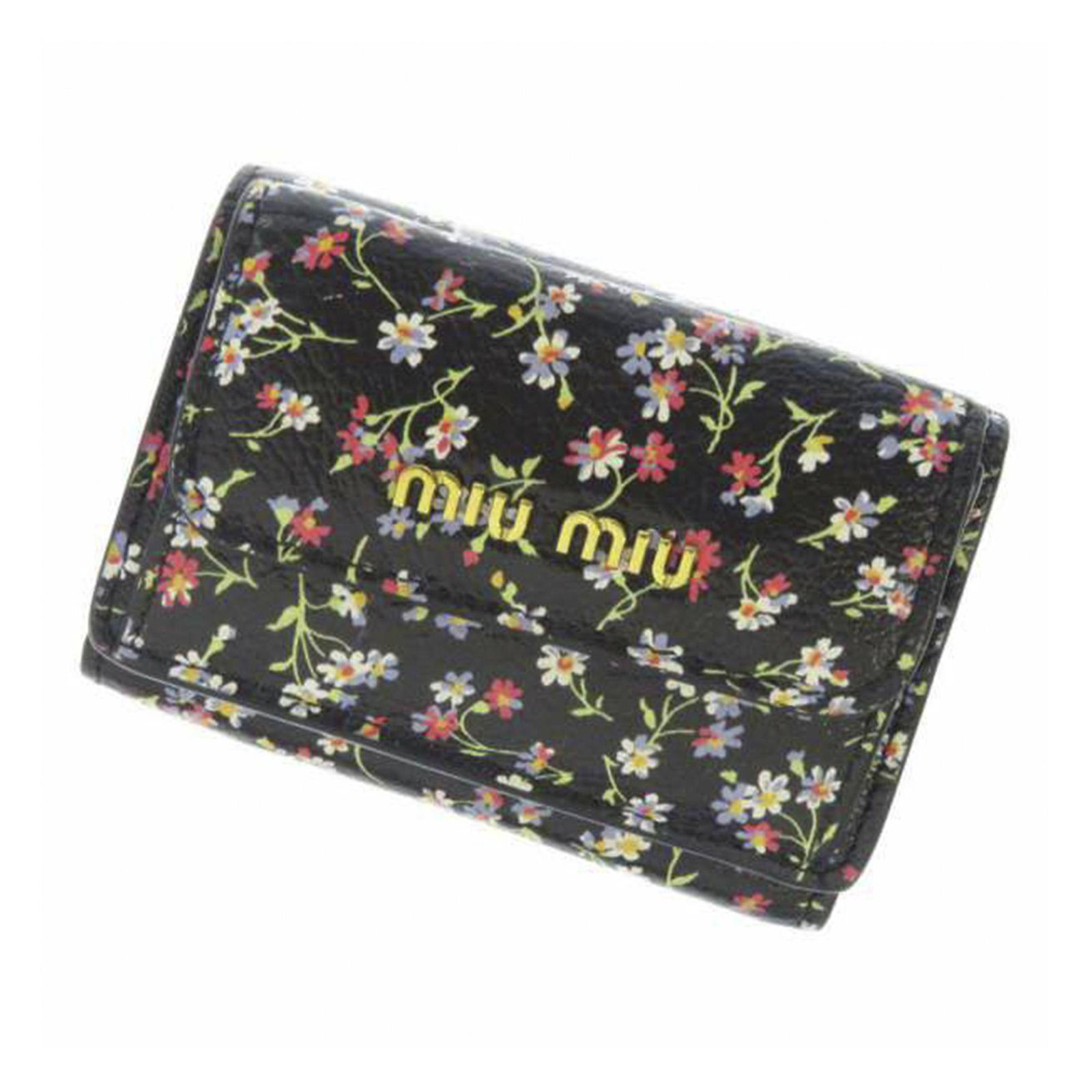 Authentic Miu Miu Printed Leather Small Wallet: This small wallet features a printed leather body a front flap with snap closure and interior slip pockets. Brand: Miu Miu Model: Printed Leather Small Wallet Origin: Italy Category: SLG Color: Black 