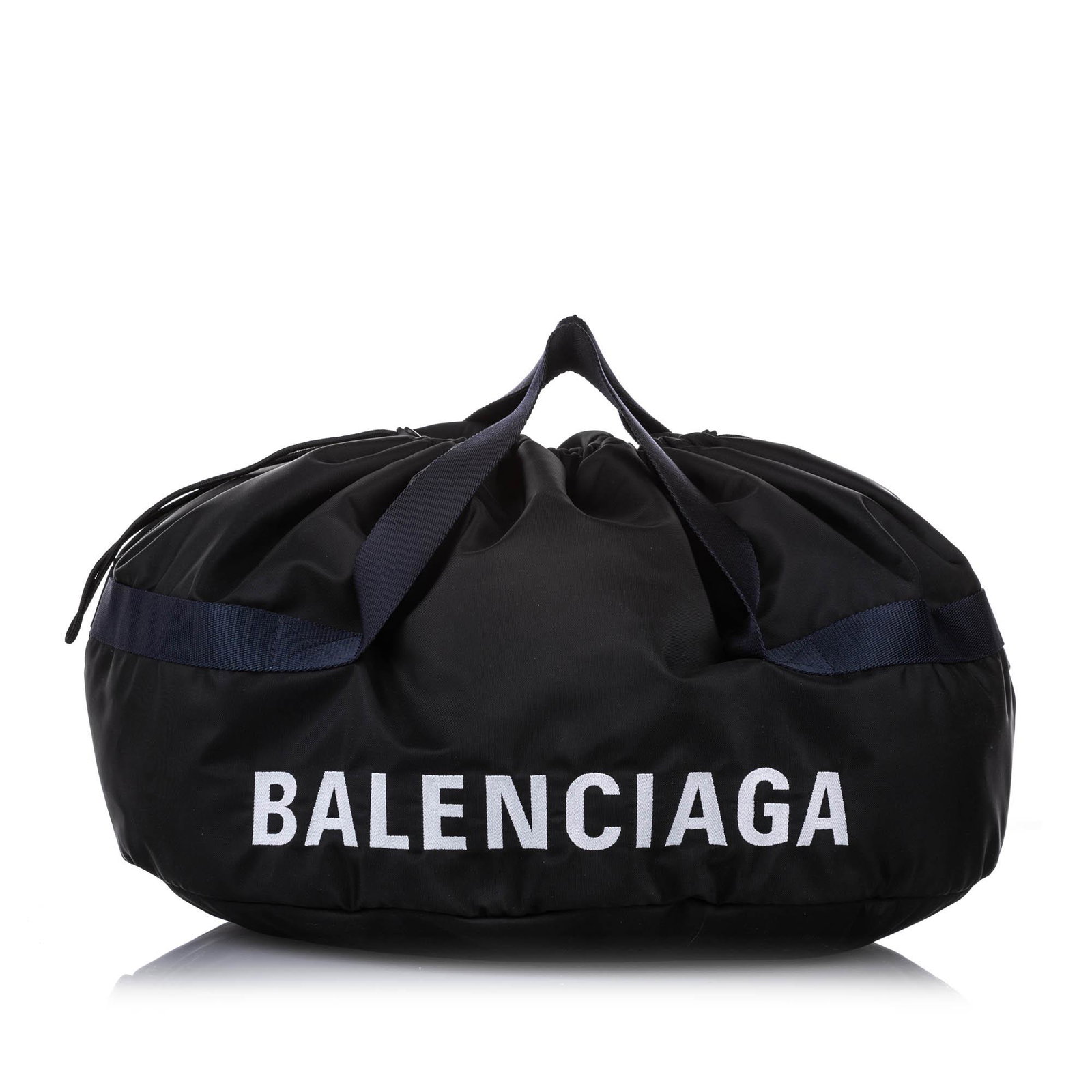 Authentic Balenciaga S Wheel Everyday Nylon Travel Bag: The Wheel Everyday features a nylon body flat canvas handles a top drawstring closure and interior zip and slip pockets. Brand: Balenciaga Model: S Wheel Everyday Nylon Travel Bag Origin: Italy Catego