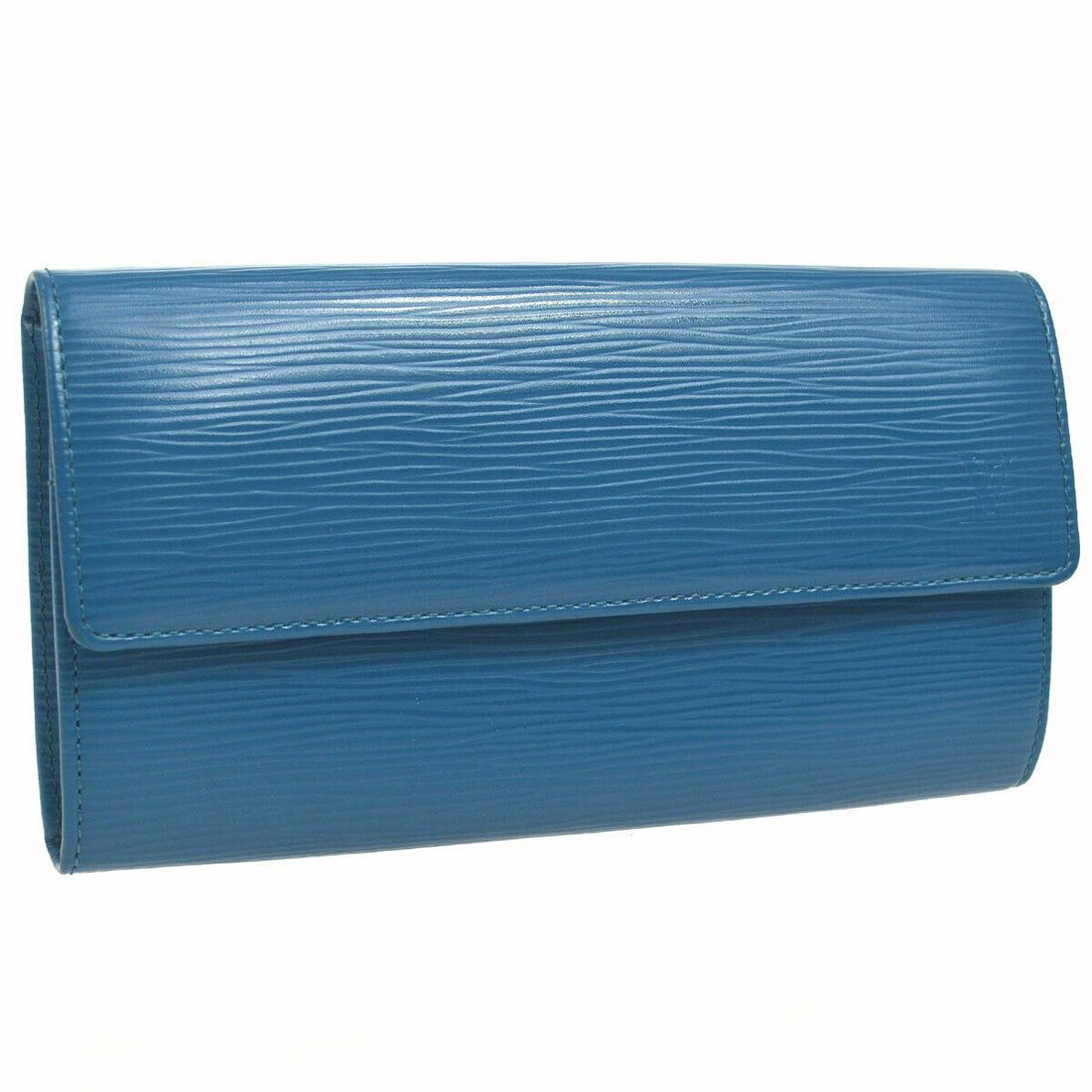Authentic LOUIS VUITTON Bifold: Brand: LOUIS VUITTON Model: Bifold Country of Origin: Spain Material: Epi Leather Color: Blue Size (Inch): W 7.3 x H 4.1 " Size (CM): W 18.5 x H 10.5 cm All Bidhaus items come with a 100 % money-back 