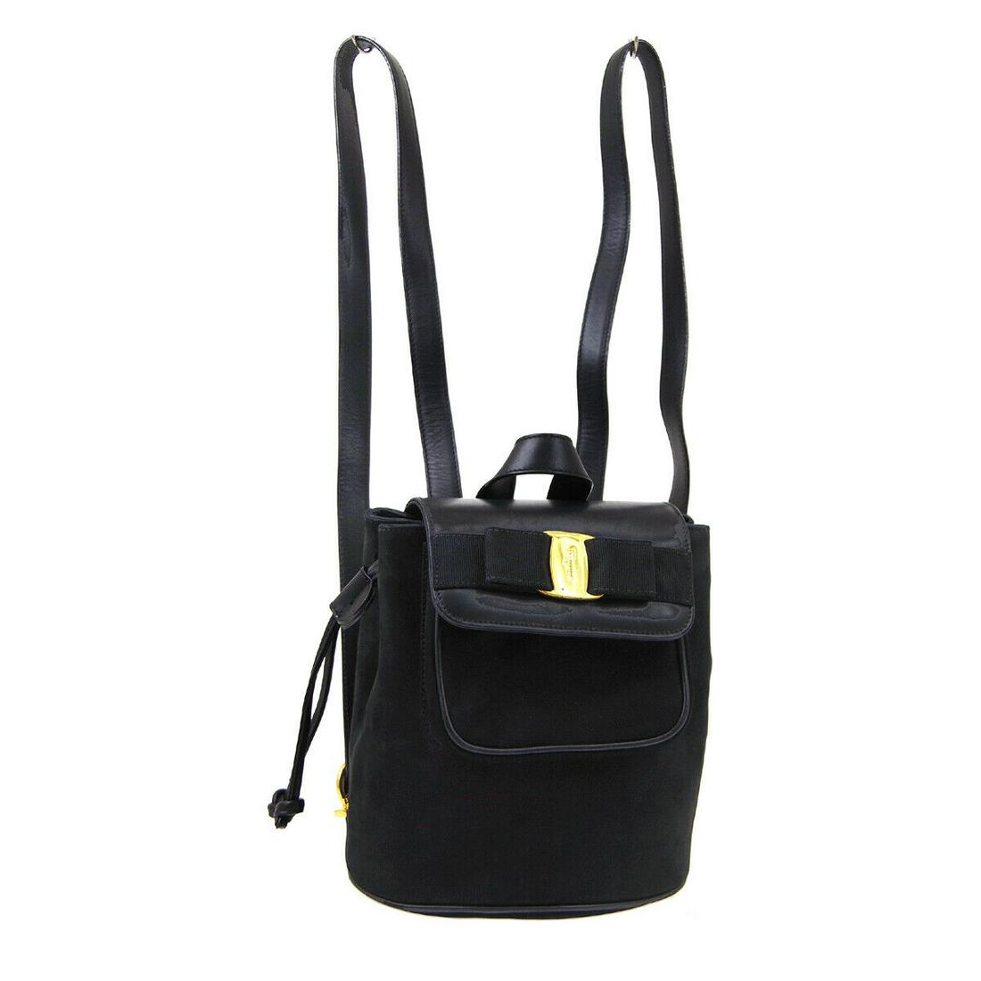 Authentic SALVATORE FERRAGAMO Backpack: Brand: SALVATORE FERRAGAMO Model: Backpack Country of Origin: Italy Material: Canvas Color: Black Size (Inch): W 7.1 x H 8.3 x D 4.9 " Handle Drop. 3.1 "Strap total length. 30.3 - 32.7 " Size (CM): W