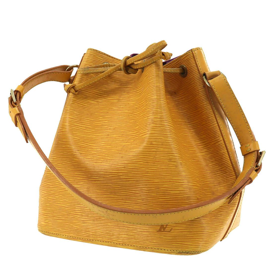 Authentic LOUIS VUITTON Shoulder Bag: Brand: LOUIS VUITTON Model: Shoulder Bag Country of Origin: France Material: Suede Color: Gold Bag Length: 9.8 Bag Height: 10.6 Bag Depth: 7.4 All Bidhaus items come with a 100 % money-back authentici