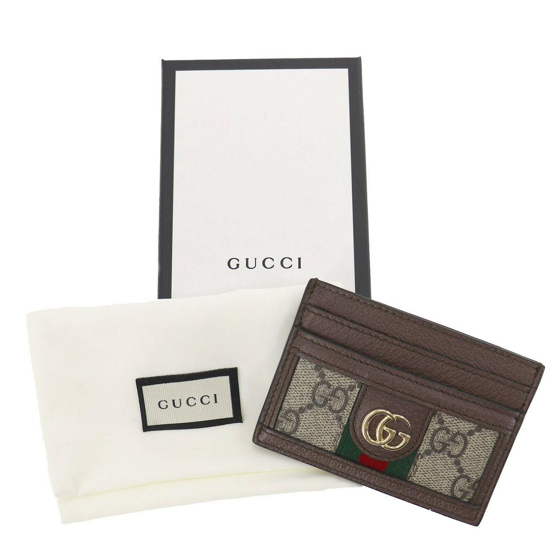 Authentic GUCCI Card Case: Brand: GUCCI Model: Card Case Country of Origin: Italy Material: PVC Color: Brown All Bidhaus items come with a 100 % money-back authenticity guarantee. ALL SALES ARE FINAL. Please refer to images car