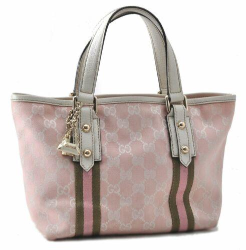 Authentic GUCCI Hand Bag: Brand: GUCCI Model: Hand Bag Country of Origin: Italy Material: Canvas Color: Pink Bag Length: 8.3inches (21cm) Bag Height: 6.9inches (17.5cm) Bag Depth: 4.1inches (10.5cm) All Bidhaus items come with