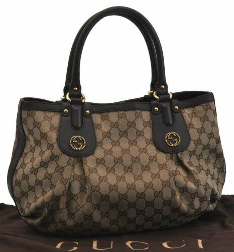 Authentic GUCCI Hand Bag: Brand: GUCCI Model: Hand Bag Country of Origin: Italy Material: Canvas Color: Brown Bag Length: 13.4inches (34cm) Bag Height: 11.8inches (30cm) Bag Depth: 6.7inches (17cm) All Bidhaus items come with 