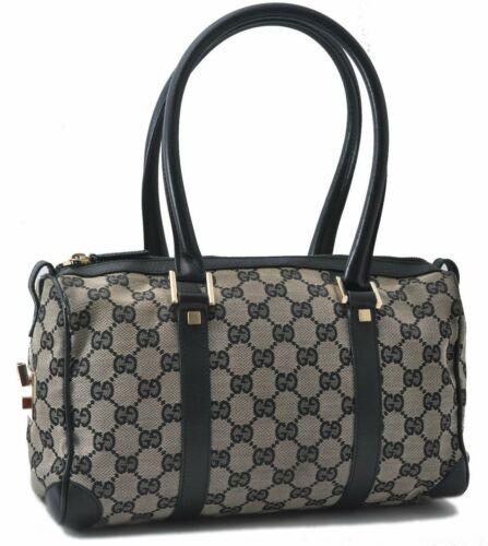 Authentic GUCCI Hand Bag: Brand: GUCCI Model: Hand Bag Country of Origin: Italy Material: Canvas Color: Black Bag Length: 11.2inches (28.5cm) Bag Height: 6.5inches (16.5cm) Bag Depth: 3.9inches (10cm) All Bidhaus items come wi