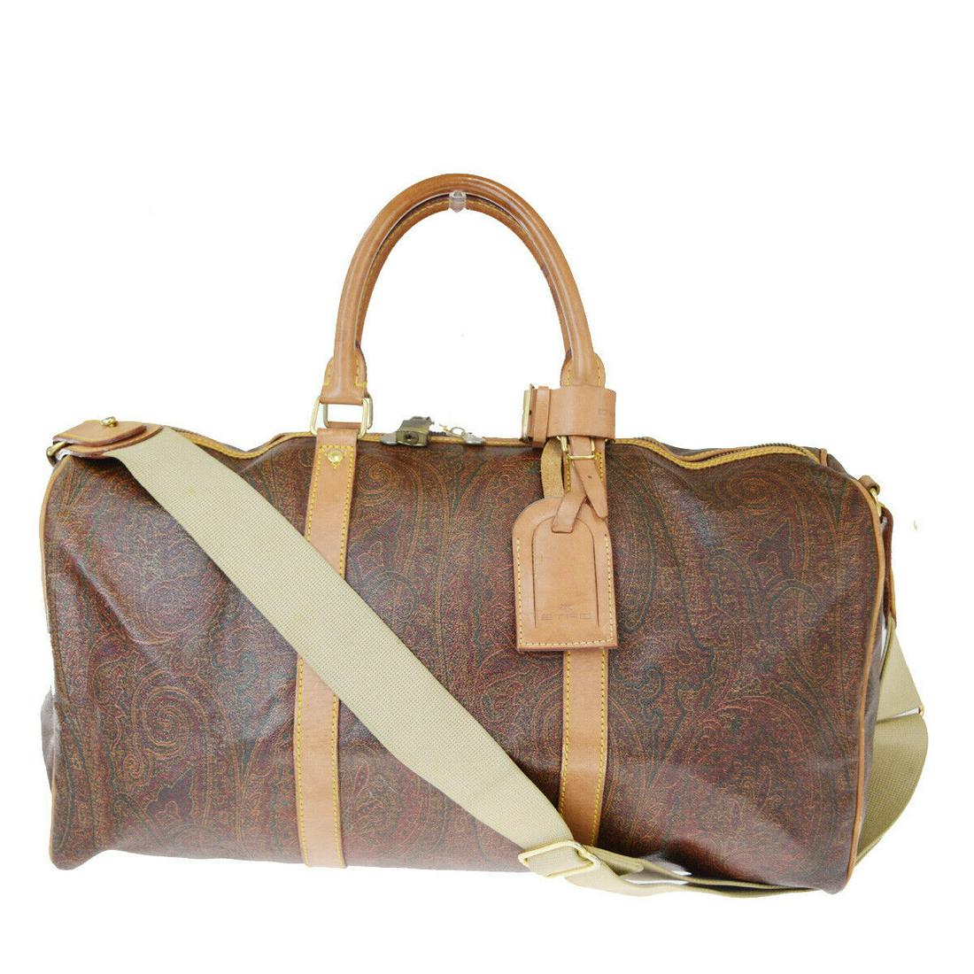 Authentic ETRO Shoulder Hand Bag: Brand: ETRO Model: Shoulder Hand Bag Country of Origin: Italy Material: PVC Leather Color: Bordeaux Size (Inch): W18.9X H10.2X D9.4"Size (CM): W48X H26X D24Cm All Bidhaus items come with a 100 % money