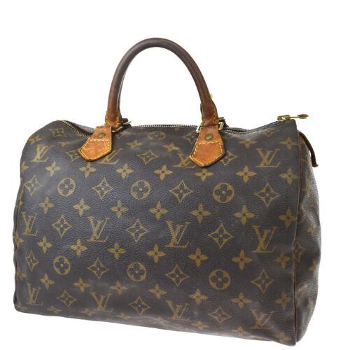 Authentic LOUIS VUITTON Speedy 30 Double Handles: Brand: LOUIS VUITTON Model: Speedy 30 Double Handles Country of Origin: Material: Gold-Plated Color: Brown Size (Inch): W 11.8 X H 8.7 X D 7.1 &Quot;Size (CM): W 30 X H 22 X D 18 Cm All Bidhaus items 
