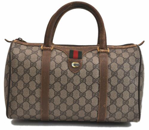 Authentic GUCCI Hand Bag: Brand: GUCCI Model: Hand Bag Country of Origin: Italy Material: PVC Color: Brown Bag Length: 12.6inches (32cm) Bag Height: 7.5inches (19cm) Bag Depth: 5.9inches (15cm) All Bidhaus items come with a 10