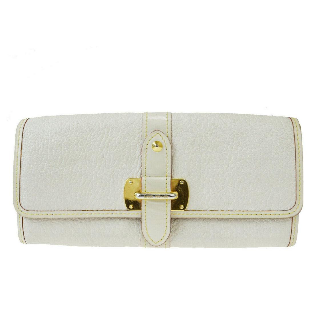 Authentic LOUIS VUITTON Wallet: Brand: LOUIS VUITTON Model: Wallet Country of Origin: Material: Suhali Leather Color: White Size (Inch): W8.3X H3.7 X D0"Size (CM): W21X H9.5 X D0Cm All Bidhaus items come with a 100 % money-back auth