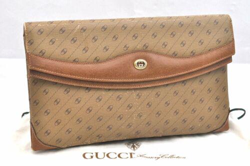 Authentic GUCCI Clutch Bag: Brand: GUCCI Model: Clutch Bag Country of Origin: Italy Material: PVC Color: Beige Bag Length: 12.2inches(31cm) Bag Height: 7.3inches(18.5cm) Bag Depth: 1.4inches(3.5cm) All Bidhaus items come with a 