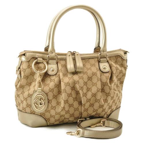 Authentic GUCCI GG Canvas Interlocking 2Way Hand Bag: Brand: GUCCI Color: Beige Style: Hand Bag Size: W29 x H24 x D13cm / Shoulder Drop 46-48cm(Approx) Material: Canvas UPC: Does not apply All Bidhaus items come with a 100% money-back authenticity guaran