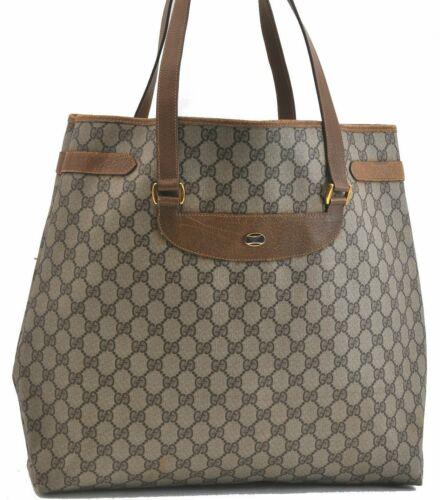 Authentic GUCCI Tote Bag: Brand: GUCCI Model: Tote Bag Country of Origin: Italy Material: PVC Color: Brown Bag Length: 15.7inches (40cm) Bag Height: 14.2inches (36cm) Bag Depth: 3.5inches (9cm) All Bidhaus items come with a 10