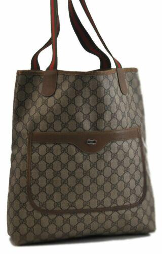 Authentic GUCCI Shoulder Bag: Brand: GUCCI Model: Shoulder Bag Country of Origin: Italy Material: PVC Color: Brown Bag Length: 12.2inches (31cm) Bag Height: 14.2inches (36cm) Bag Depth: 3.5inches (9cm) All Bidhaus items come with 