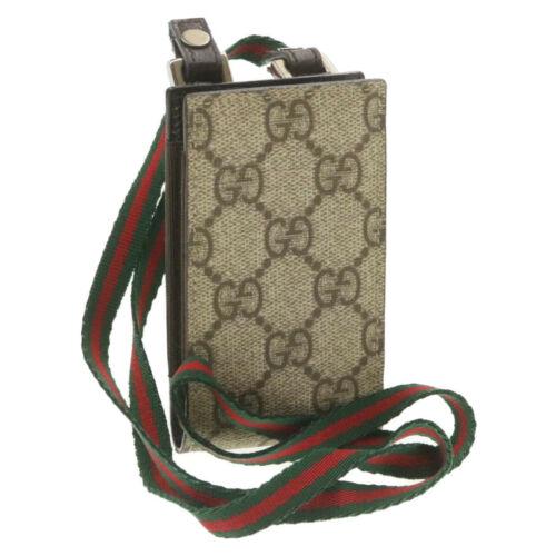 Authentic GUCCI Web Sherry Line GG Canvas Cell Phone: Brand: GUCCI Style: Clutch Bag Color: Beige Size: W6 x H10.5 x D2cm / Strap Length 44cm(Approx) Material: PVC Leather Country/Region of Manufacture: Italy UPC: Does not apply EAN: Does not apply All B