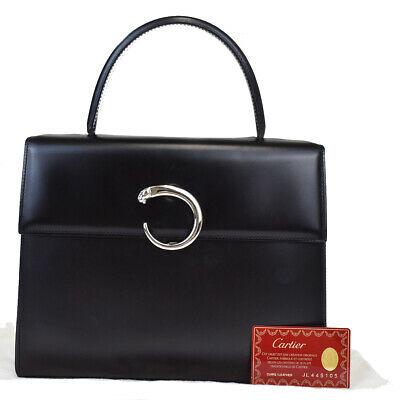 Authentic CARTIER Hand Bag: Brand: CARTIER Model: Hand Bag Country of Origin: France Material: Leather Color: Black Size (Inch): W10.6X H8.3X D3.1"Size (CM): W27X H21X D8Cm All Bidhaus items come with a 100 % money-back authenti
