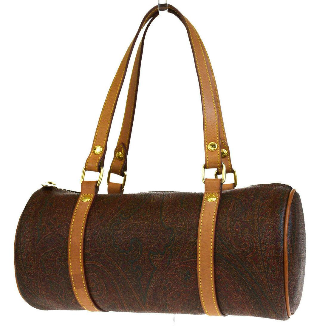 Authentic ETRO Hand Bag: Brand: ETRO Model: Hand Bag Country of Origin: Italy Material: PVC Leather Color: Bordeaux Size (Inch): W10.2X H4.7X D4.7"Size (CM): W26X H12X D12Cm All Bidhaus items come with a 100 % money-back auth