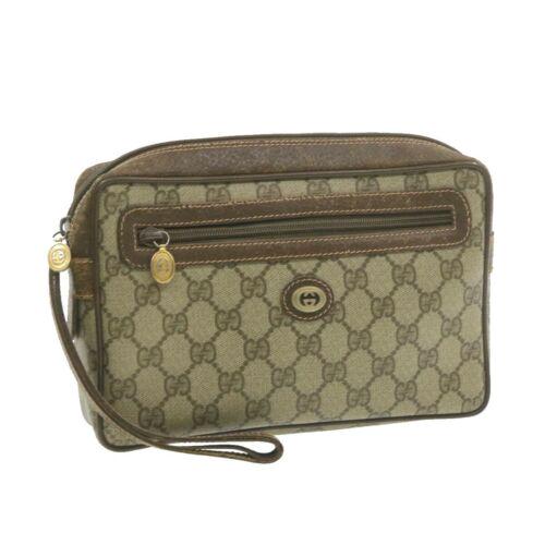Authentic GUCCI GG Canvas Clutch Bag Beige PVC Leather: Brand: GUCCI Style: Clutch Bag Color: Beige Size: W24 x H15.5 x D5cm(Approx) Material: PVC Leather Country/Region of Manufacture: Italy UPC: Does not apply EAN: Does not apply All Bidhaus items come w