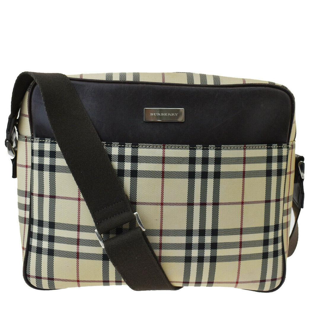 Authentic BURBERRY Crossbody Strap: Brand: BURBERRY Model: Crossbody Strap Country of Origin: Material: Nylon Color: Beige Size (Inch): W11X H8.7X D3.1"Size (CM): W28X H22X D8Cm All Bidhaus items come with a 100 % money-back authenticit