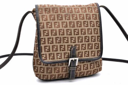 Authentic FENDI Shoulder Bag: Brand: FENDI Model: Shoulder Bag Country of Origin: Italy Material: Canvas Color: Brown Bag Length: 8.7inches (22cm) Bag Height: 8.7inches (22cm) Bag Depth: 0.6inches (1.5cm) All Bidhaus items come wi
