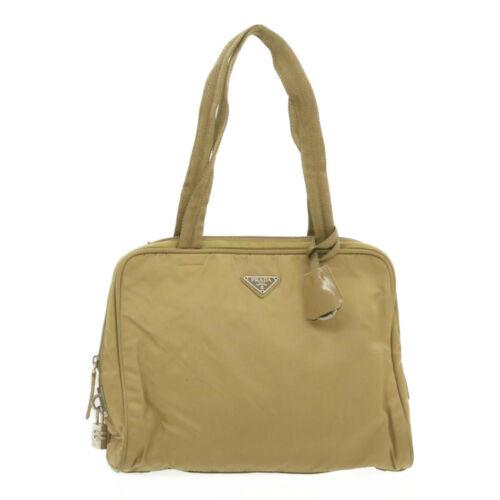 Authentic PRADA Nylon Tote Bag Beige: Brand: PRADA Style: Shoulder Bag Color: Beige Size: W32 x H25 x D10cm(Approx) Material: Nylon Country/Region of Manufacture: Italy UPC: Does not apply EAN: Does not apply All Bidhaus items come with a
