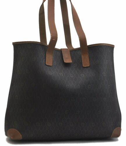 Authentic CHRISTIAN DIOR Shoulder Bag: Brand: CHRISTIAN DIOR Model: Shoulder Bag Country of Origin: Material: PVC Color: Black Bag Length: 15.7inches (40cm) Bag Height: 13.2inches (33.5cm) Bag Depth: 5.5inches (14cm) All Bidhaus items come