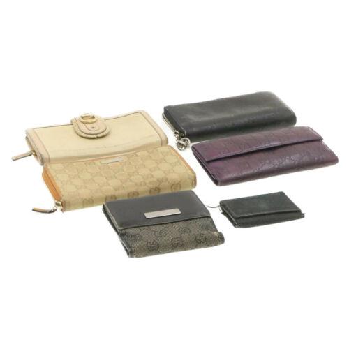 Authentic GUCCI GG Canvas Wallet Key Case 6Set Black: Brand: GUCCI Material: Canvas / Leather Color: Black / Beige / Purple Country/Region of Manufacture: Italy UPC: Does not apply EAN: Does not apply All Bidhaus items come with a 100% money-back authent