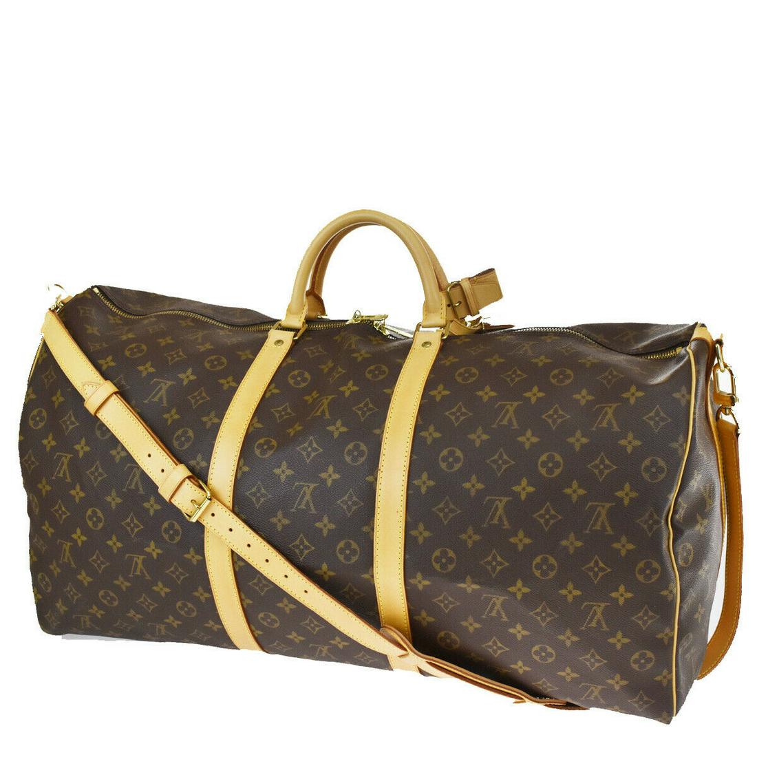 Authentic LOUIS VUITTON Keepall 60 Double Handles: Brand: LOUIS VUITTON Model: Keepall 60 Double Handles Country of Origin: France Material: Canvas Color: Brown Size (Inch): W 23.6 X H 12.6 X D 9.8 "Size (CM): W 60 X H 32 X D 25 Cm All Bidhaus items c