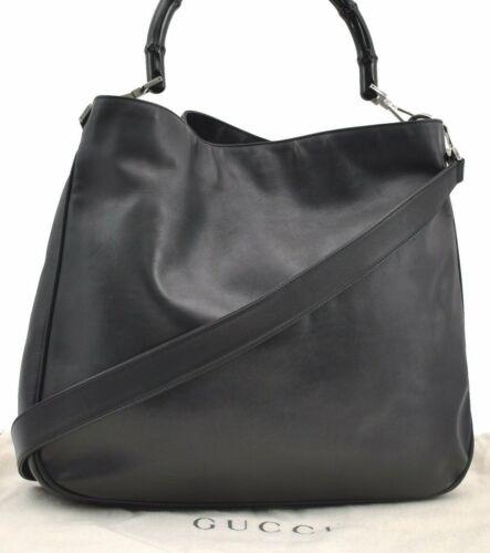 Authentic GUCCI Hand Bag: Brand: GUCCI Model: Hand Bag Country of Origin: Italy Material: Leather Color: Black Bag Length: 15.2inches (38.5cm) Bag Height: 13.2inches (33.5cm) Bag Depth: 4.1inches (10.5cm) All Bidhaus items com
