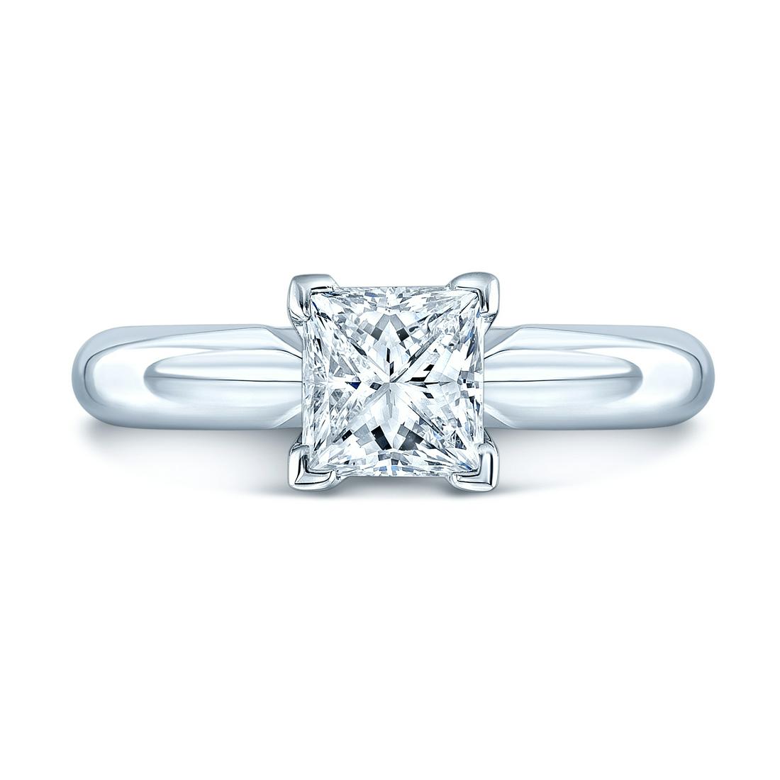 Princess Cut Solitaire Engagement Ring In 14k White: Exquisite Solitaire Ring With 6.5mm Princess Cubic Zirconia Set In 14 Karat White Gold Mounting 14 Karat White Gold Solitaire Ring Princess Cut Cubic Zirconia 6.5mm Tag Description: 14KW SOL RING PRIN