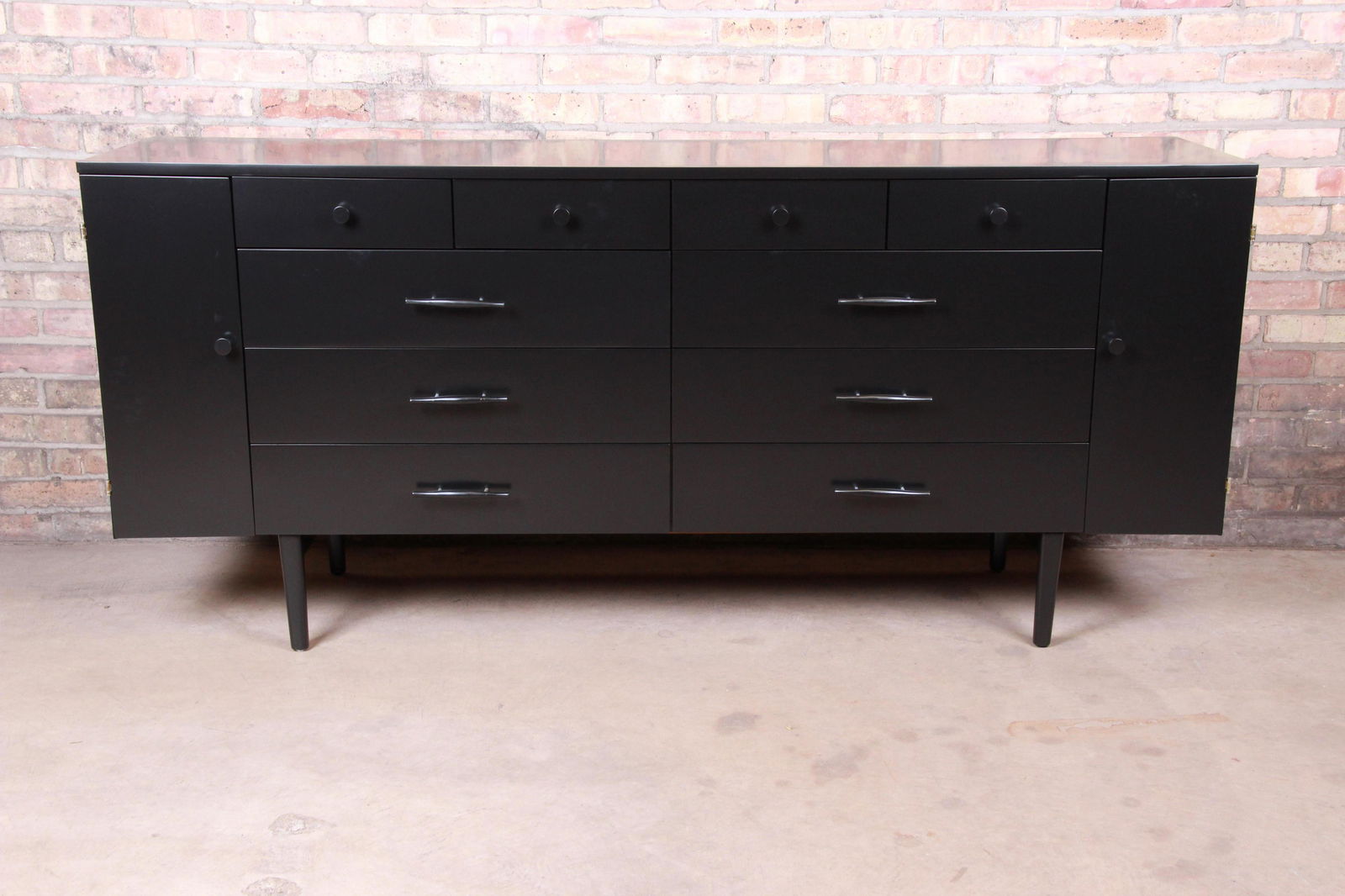 Paul McCobb Planner Group Black Lacquered 20-Drawer: A rare and exceptional mid-century modern 20-drawer dresser or credenza By Paul McCobb for Winchendon Furniture "Planner Group" USA 1950s Black lacquered solid birch with original sculpted birch and a