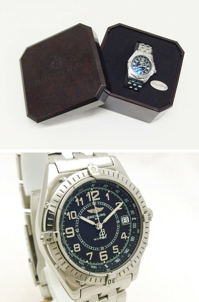 Authentic BREITLING Wings Quartz Black Dial A66050: Condition: Used (pre-owned) Wrist size is 19.5 cm. Case size is 38 mm. There are small scars and rubbing from normal use which may not be seen from the pictures. if you want the one without single sca