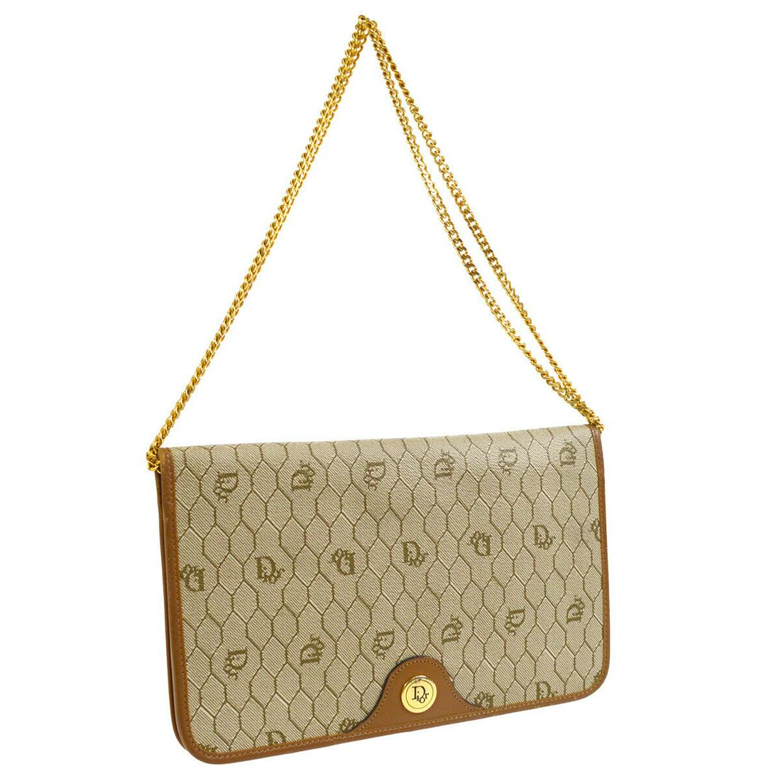 Authentic CHRISTIAN DIOR Shoulder Bag: Brand: CHRISTIAN DIOR Model: Shoulder Bag Country of Origin: France Material: Leather Color: Brown Beige Size (Inch): W 9.8 x H 6.3 x D 1.2 " Strap Drop.(Single) 13.8 " Strap Drop.(Double) 8.3 " Size 