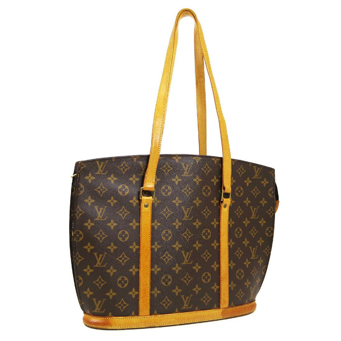 Authentic LOUIS VUITTON Monogram Tote: Brand: LOUIS VUITTON Model: Monogram Tote Country of Origin: France Material: Leather Color: Brown Size (Inch): W 13.8 x H 12.2 x D 4.3 "Strap Drop. 12.6 " Size (CM): W 35.0 x H 31.0 x D 11.0 cmStrap 