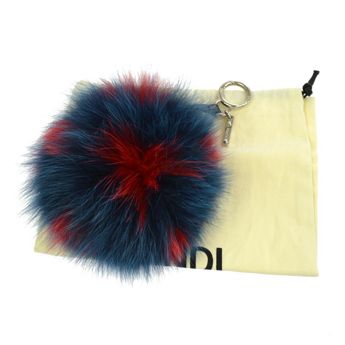 Authentic FENDI Handbag Charm: Brand: FENDI Model: Handbag Charm Country of Origin: Material: Fur Color: Blue Size (Inch): Length: 8.3 "Charm: Diameter: 5.1 " Size (CM): Length: 21.0 cmCharm: Diameter: 13.0 cm All Bidhaus items com