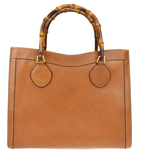 Authentic GUCCI Logo Bamboo Tote Hand Bag Leather Brown: Size: Medium Color: Black Style: Hand Bag Brand: Gucci Bag Height: 11.0 Bag Depth: 5.1 Material: Bamboo Leather Bag Width: 13.4 All Bidhaus items come with a 100% money-back authenticity guarantee. AL