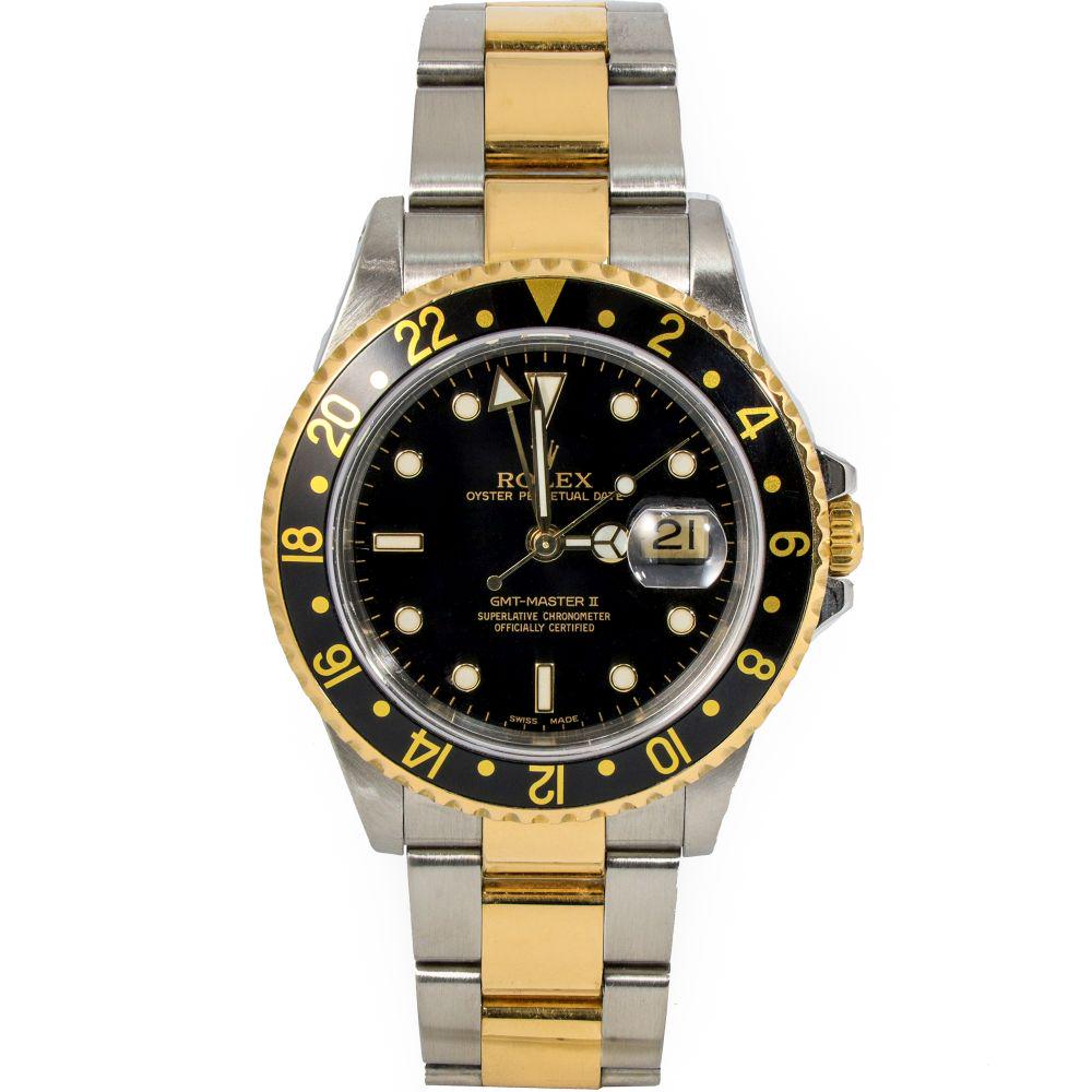 Authentic Rolex Date GMT - Master II Two-Tone Oyster: Brand: Rolex Model: DATE GMT - MASTER II REF# 16713 Case Metal: STAINLESS STEEL Case Size: 40MM Bracelet Material: TWO-TONE OYSTER Bracelet Bracelet size: fits up to 7.5 inches long CIRCA: 2000 Dial: 