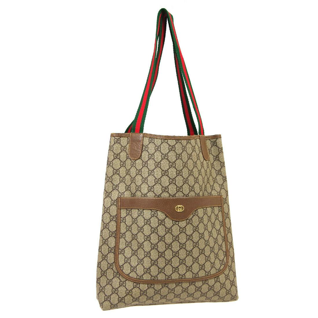 Authentic GUCCI Hand Tote: Brand: GUCCI Model: Hand Tote Country of Origin: Italy Material: Canvas Color: Brown Green Red Size (Inch): W 11.8 x H 14.2 x D 3.5 " Strap Drop. 11.4 " Size (CM): W 30.0 x H 36.0 x D 9.0 cm Strap Dro