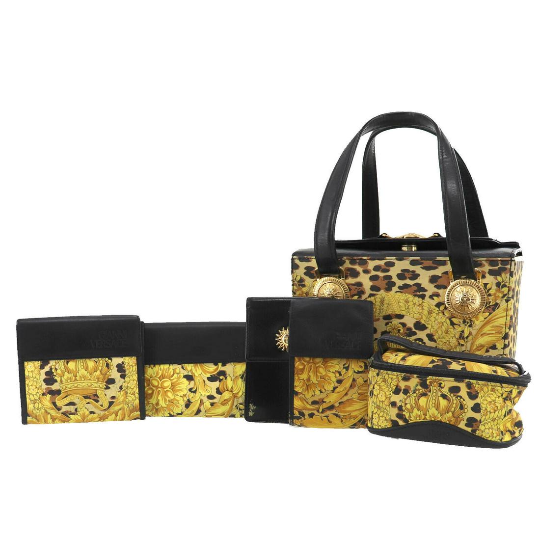 Authentic GIANNI VERSACE Hand Bag: Brand: GIANNI VERSACE Model: Hand Bag Country of Origin: Unknown Material: Leather Color: Yellow Brown Black Bag Length: 8.2 Bag Height: 6.2 Bag Depth: 5.1 All Bidhaus items come with a 100 % money-ba