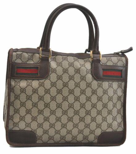Authentic GUCCI Hand Bag: Brand: GUCCI Model: Hand Bag Country of Origin: Italy Material: PVC Color: Brown Bag Length: 12.4inches (31.5cm) Bag Height: 9.8inches (25cm) Bag Depth: 6.3inches (16cm) All Bidhaus items come with a 