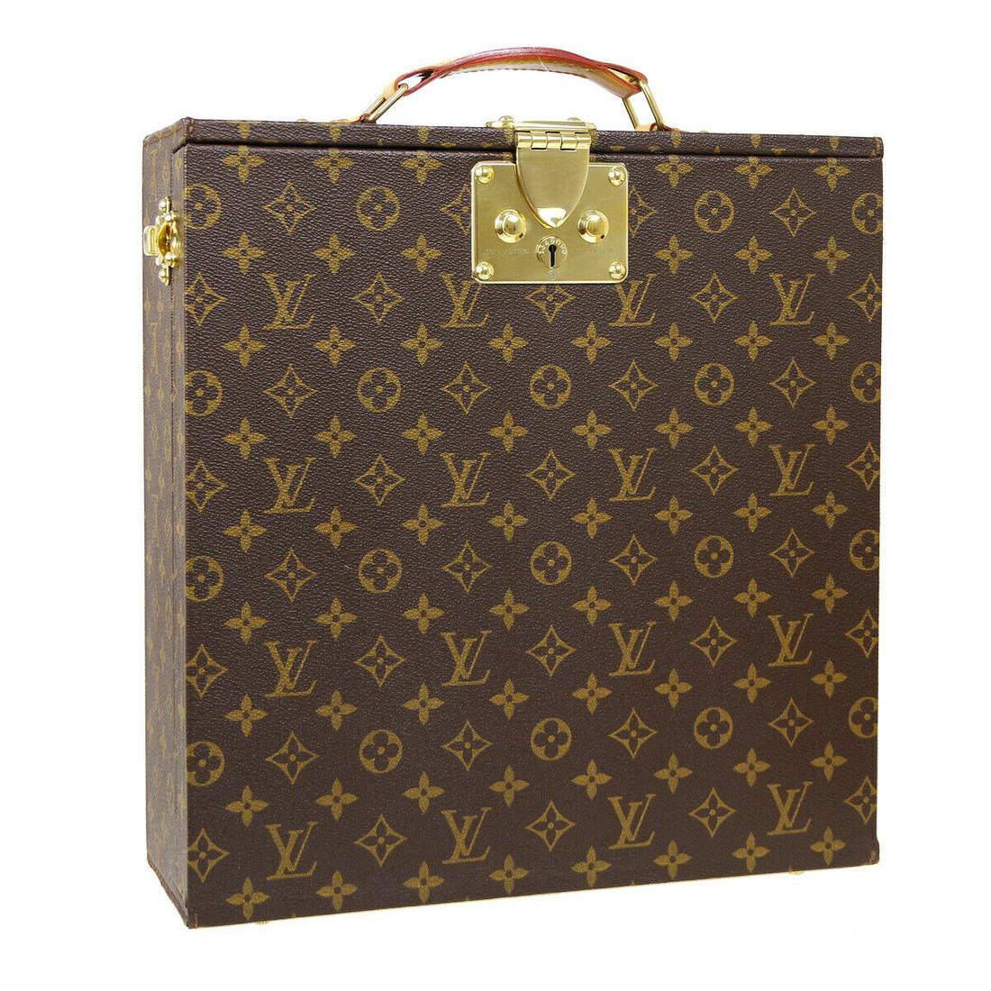 Authentic LOUIS VUITTON Wine Case 1 Bottle Trunk Hand: Brand: LOUIS VUITTON Model: Wine Case 1 Bottle Trunk Hand Bag Country of Origin: France Material: Monogram canvas Leather Color: Monogram Size (Inch): W 13.2 x H 13.8 x D 5.9 " Handle Drop. 2.0 " Size