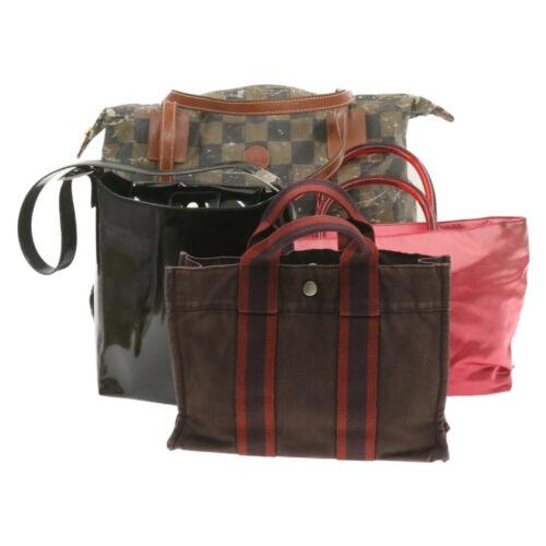 Authentic Salvatore Ferragamo PRADA FENDI HERMES Hand: Brand: Salvatore Ferragamo Material: Nylon / Canvas / Patent Leather Color: Black / Brown / Red / Wine Red Style: Hand Bag UPC: Does not apply EAN: Does not apply All Bidhaus items come with a 100% mo