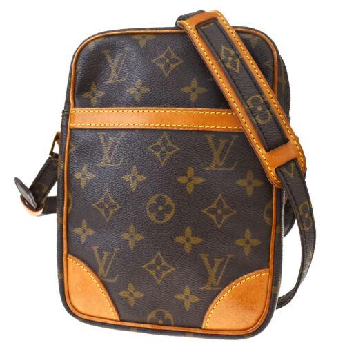 Authentic LOUIS VUITTON Danube Shoulder Bag Monogram: Brand: Louis Vuitton Material: Monogram Leather Size: Small Bag Height: 7.9 Color: Brown Bag Depth: 1.6 Department: Women Bag Length: 5.9 Style: Shoulder Bag Country of Manufacture: France All Bidhaus