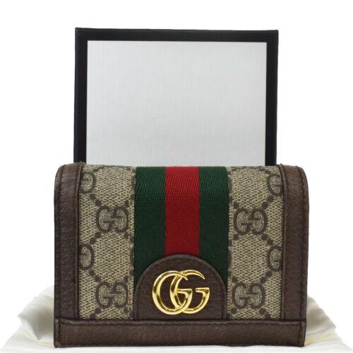 Authentic GUCCI GG Pattern Ophidia Bifold Wallet Purse: Gender: Adult Unisex Color: Brown Country/Region of Manufacture: Italy Brand: GUCCI Material: Supreme Leather All Bidhaus items come with a 100% money-back authenticity guarantee. ALL SALES ARE FINAL.