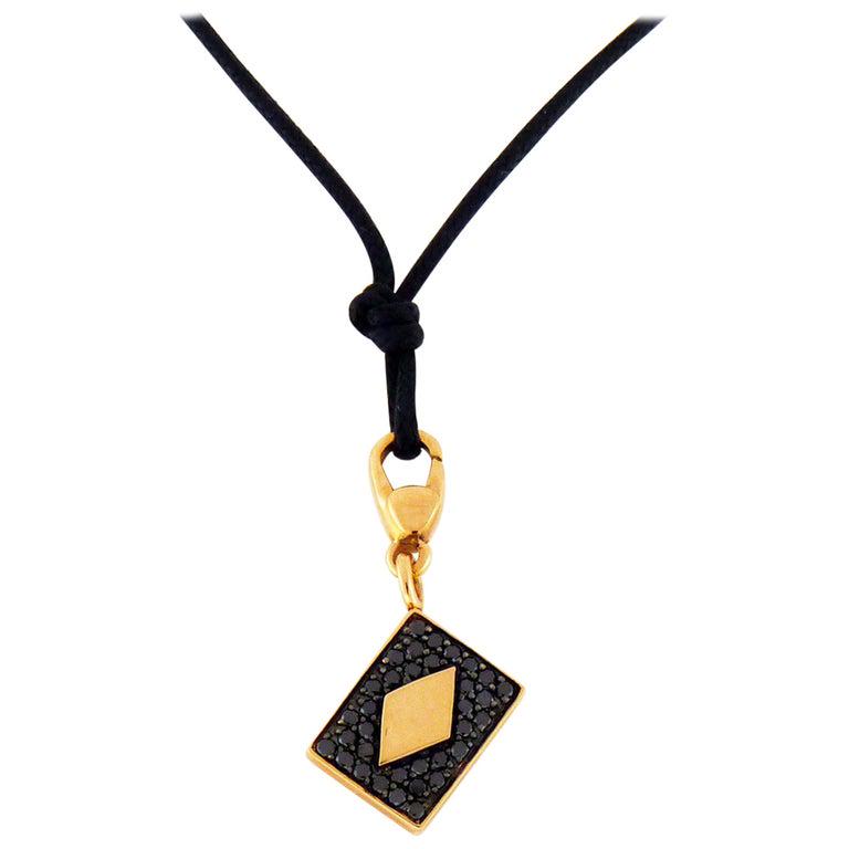 Authentic Black Diamond 18 Karat Gold Four Card: New with tags a fine Crivelli 0.35 carat black diamond 18K Rose Gold diamond card charm and/or pendant necklace suspended on a black cord with 18K gold closure. Available with three additional charms