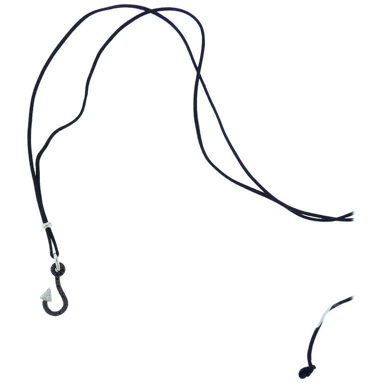 Authentic Crivelli Diamond 18K White Gold Anchor: Modern cord necklace with an anchor pendant embellished with black and white diamonds and set in 18K white gold. Created by Crivelli in Italy. Total weight of black diamonds is 0.2 carats. Total weigh