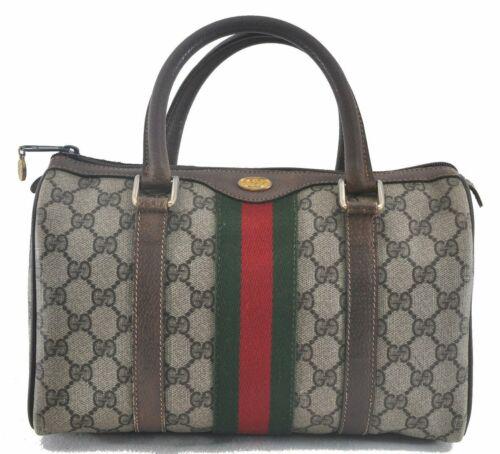 Authentic GUCCI Web Sherry Line Hand Bag GG PVC Leather: Brand: GUCCI Style: Hand Bag Country/Region of Manufacture: Italy Type: Hand Bag Serial Number: 690123841 Department: Women Bag Length: 10.6inches (27cm) Material: PVC Bag Height: 6.3inches (16cm) Col