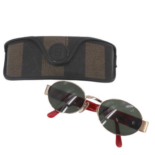 Authentic FENDI Logos Sunglasses Red Black Gold-Tone: Country/Region of Manufacture: Italy Color: Red Gold Black Department: Women Frame Material: Metal Style: Oval Lens Color: Black Temple Length: 130 mm Brand: Fendi Theme: Vintage Frame Color: Gold Typ