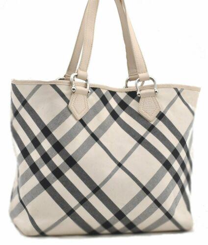Authentic Burberrys Check Canvas Leather Tote Bag White: Brand: Burberrys Bag Height: 12.2inches (31cm) Material: Canvas Bag Depth: 5.7inches (14.5cm) Style: Tote Bag MPN: Does not apply Color: White Bag Length: 13inches (33cm) Department: Women Handle Drop